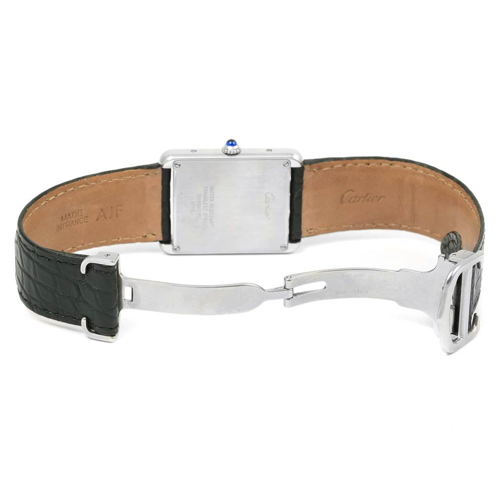 The image shows the back view of the Cartier Tank Solo W1018355 Stainless Steel Silver Dial W1018355 Stainless Steel Silver Dial watch, highlighting its square case, leather strap, and deployment clasp.