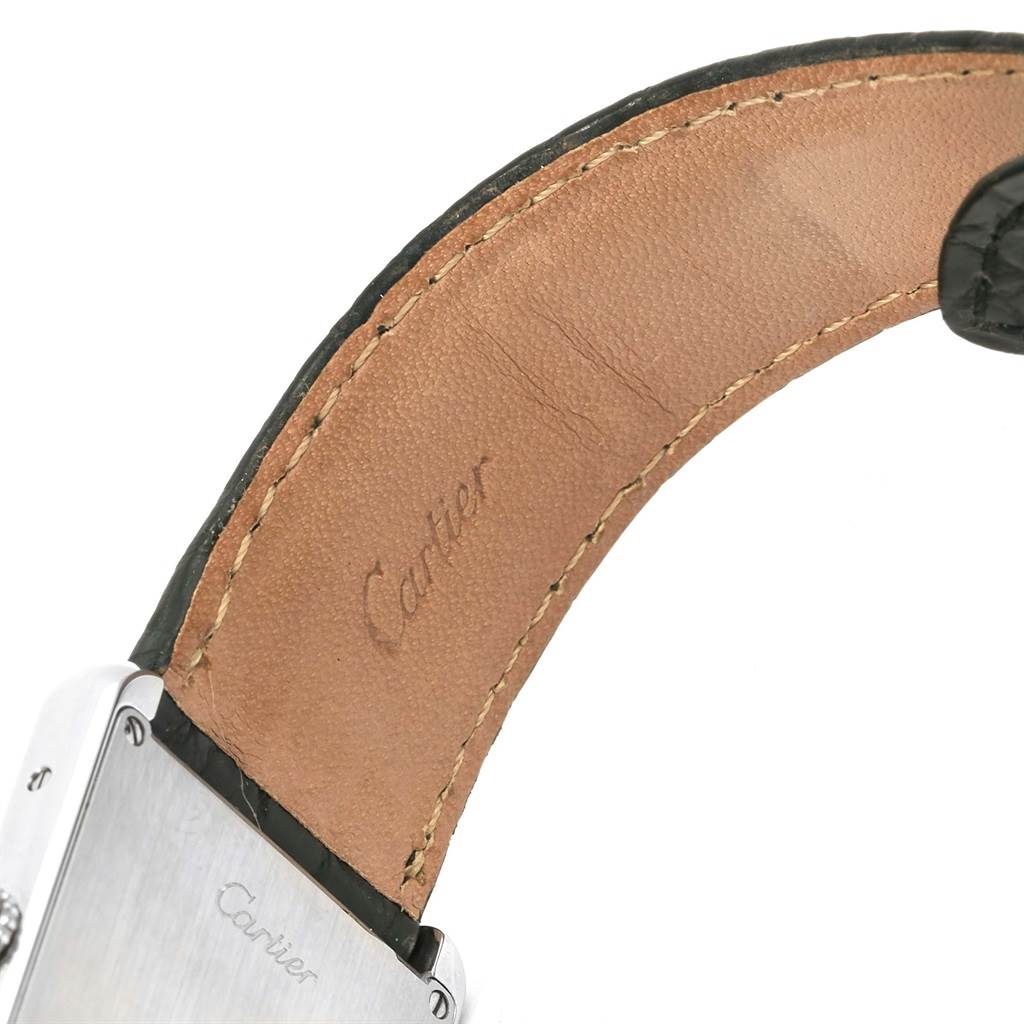 This image shows the inner leather strap and part of the stainless steel case back for a Cartier Tank Solo W1018355 Stainless Steel Silver Dial W1018355 Stainless Steel Silver Dial watch.