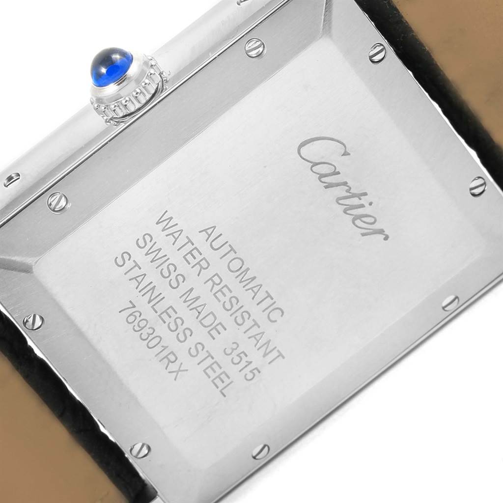 The image shows the back case and crown of a Tank Solo model by Cartier.