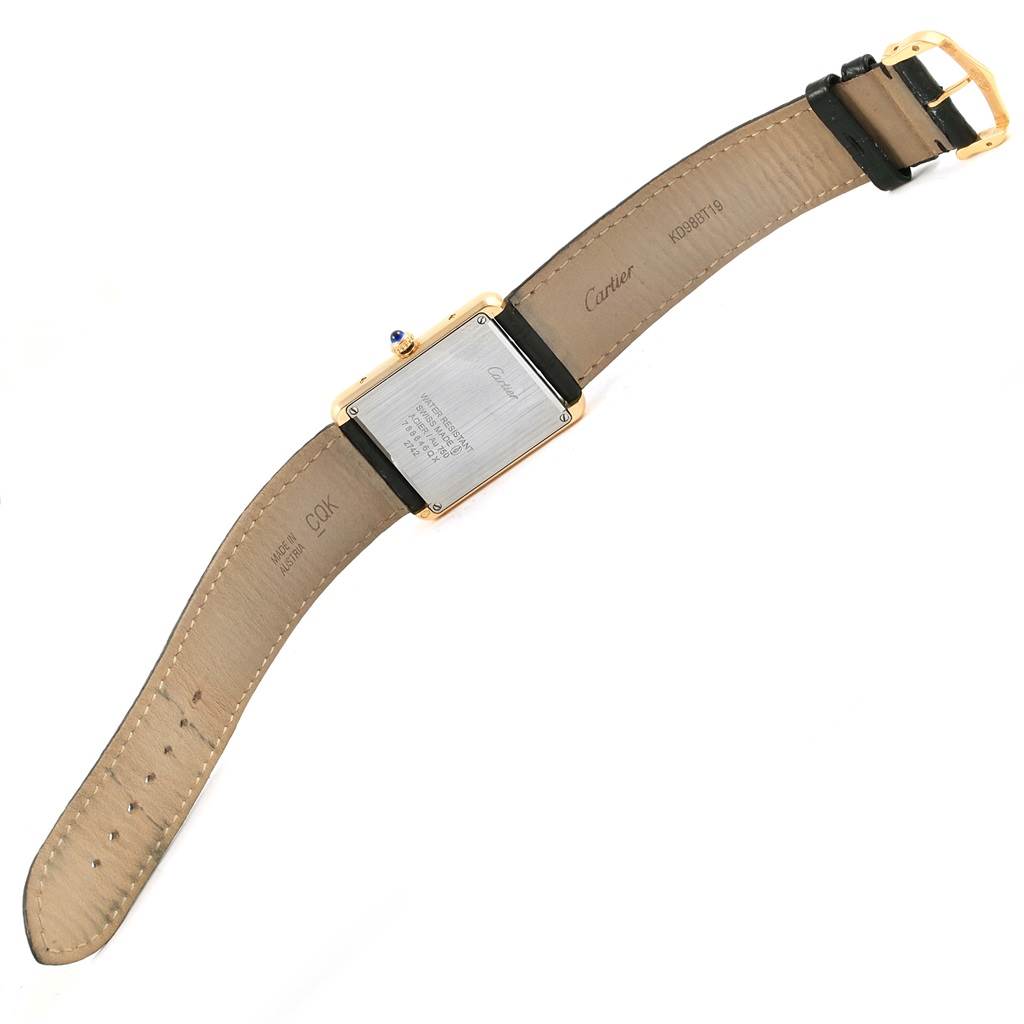 The image shows the back view of a Cartier Tank Solo W1018855 Steel and Gold (two tone) Silver Dial W1018855 Steel and Gold (two tone) Silver Dial watch, highlighting the case back, leather strap, and buckle.