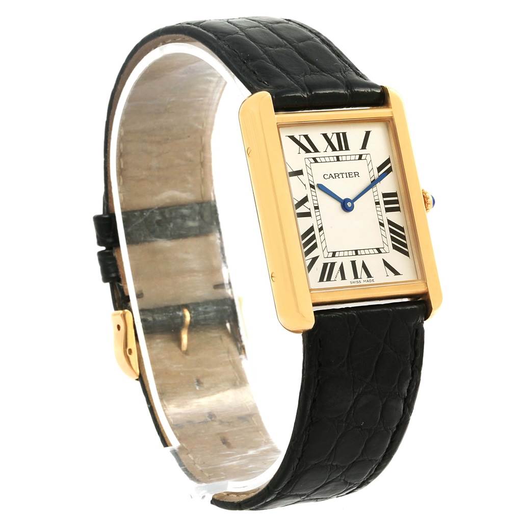 The image shows a Cartier Tank Solo W1018855 Steel and Gold (two tone) Silver Dial W1018855 Steel and Gold (two tone) Silver Dial watch from a three-quarter front angle, highlighting its face, bezel, crown, and leather strap.