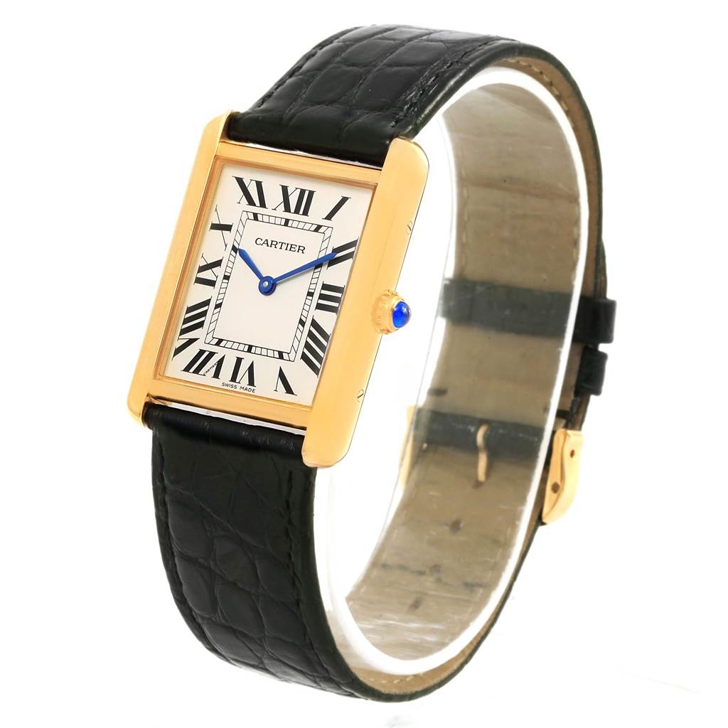The Cartier Tank Solo W1018855 Steel and Gold (two tone) Silver Dial W1018855 Steel and Gold (two tone) Silver Dial watch is shown at a slight angle featuring its rectangular face, Roman numerals, and black leather strap.