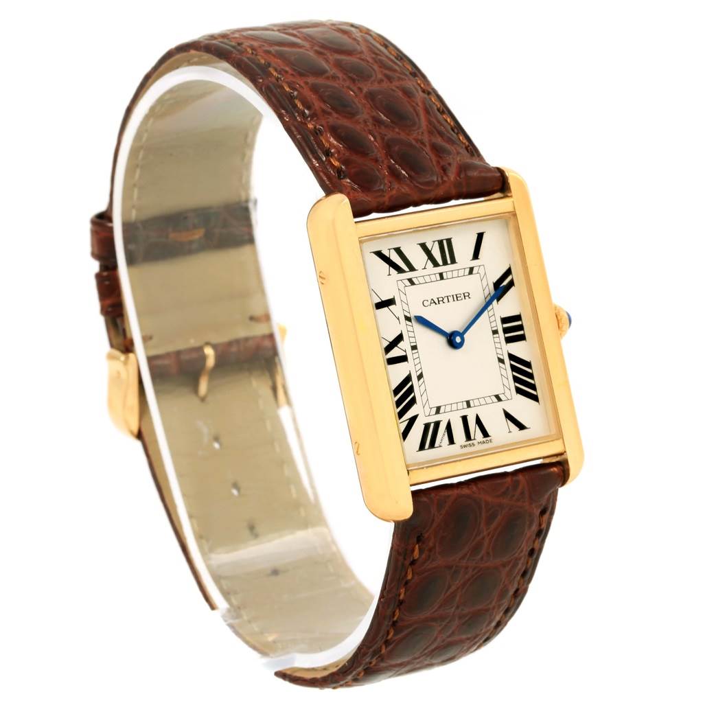 The Cartier Tank Solo W1018855 Steel and Gold (two tone) Silver Dial W1018855 Steel and Gold (two tone) Silver Dial watch is shown at a three-quarter angle, displaying its face, case, and leather strap.