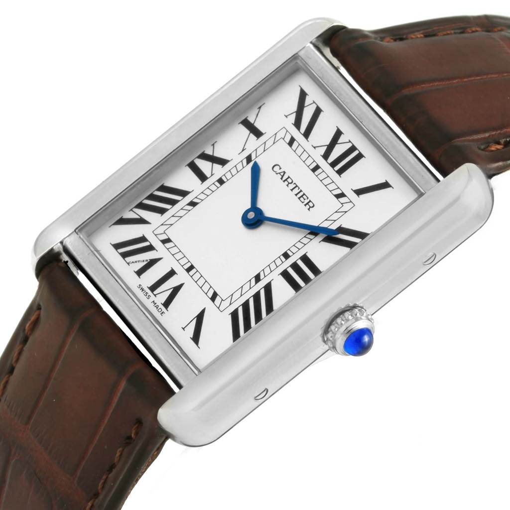 The image shows a Cartier Tank Solo W1018355 Stainless Steel Silver Dial W1018355 Stainless Steel Silver Dial watch at an angle, focusing on the dial, case, crown, and part of the leather strap.