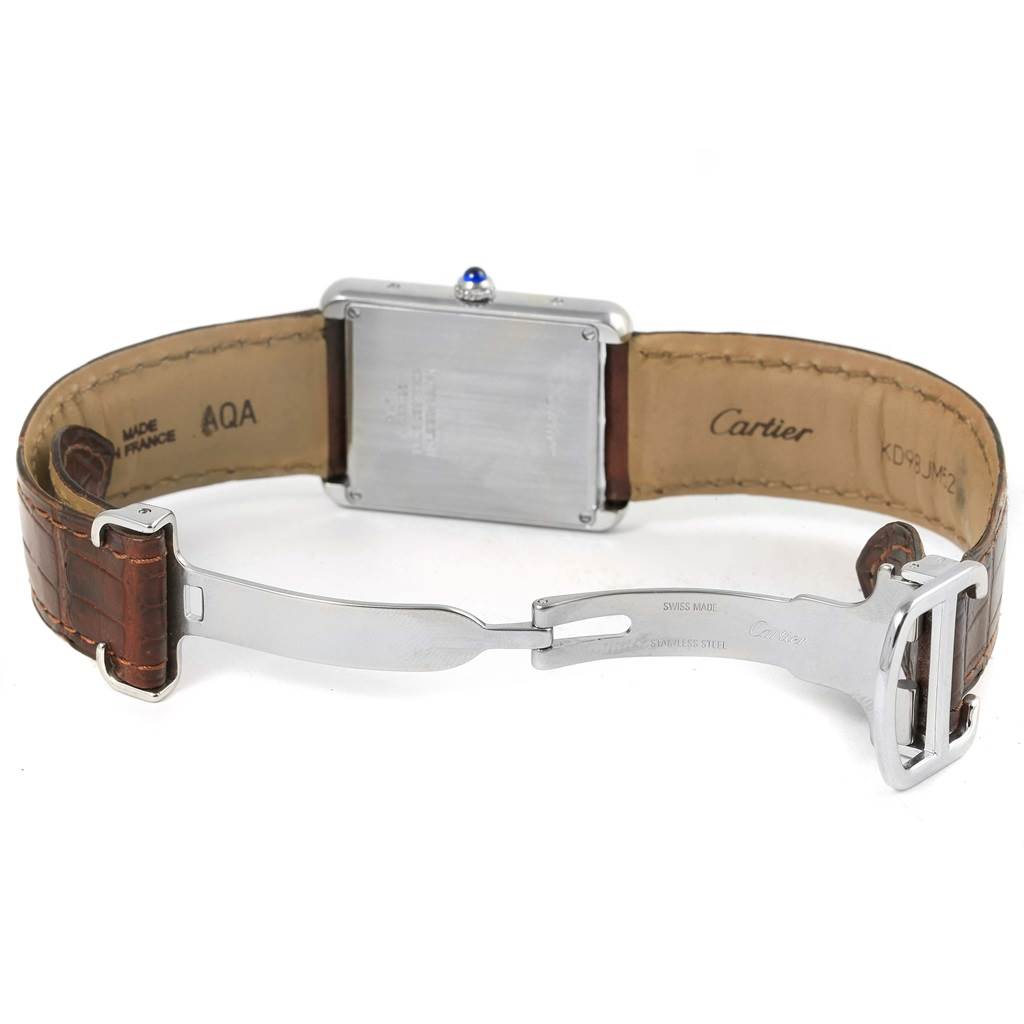 The image shows the back view of a Cartier Tank Solo W1018355 Stainless Steel Silver Dial W1018355 Stainless Steel Silver Dial watch, highlighting its leather strap and stainless steel clasp.