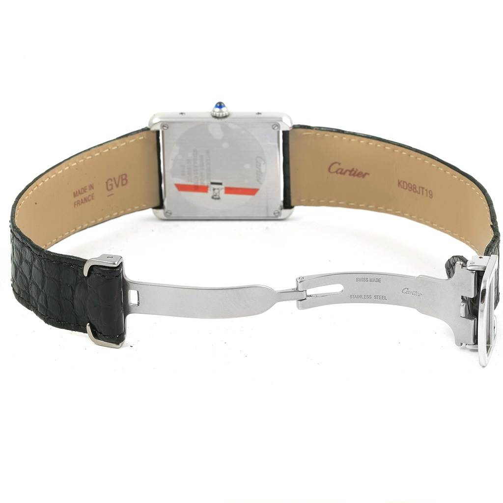 The image shows the rear view of the Cartier Tank Solo W1018355 Stainless Steel Silver Dial W1018355 Stainless Steel Silver Dial watch, highlighting the open clasp and backside of the case and strap.