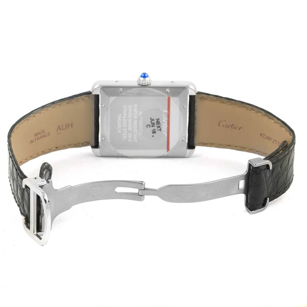 The image shows the back view of the Cartier Tank Solo W5200027 Men
s Stainless Steel Silver Dial W5200027 Men
s Stainless Steel Silver Dial watch, highlighting the open leather strap and the clasp mechanism.