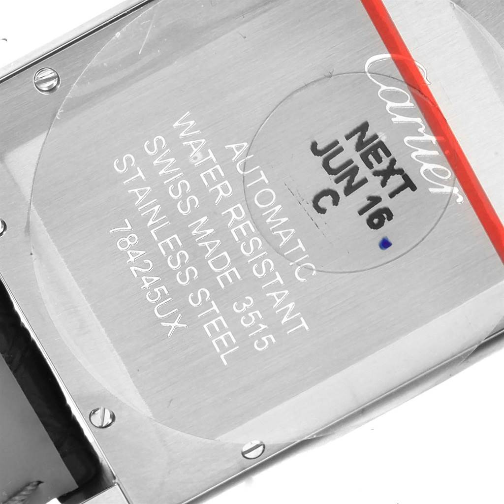 The image shows the back casing of a Cartier Tank Solo W5200027 Men
s Stainless Steel Silver Dial W5200027 Men
s Stainless Steel Silver Dial watch, highlighting the engraved details and serial number.