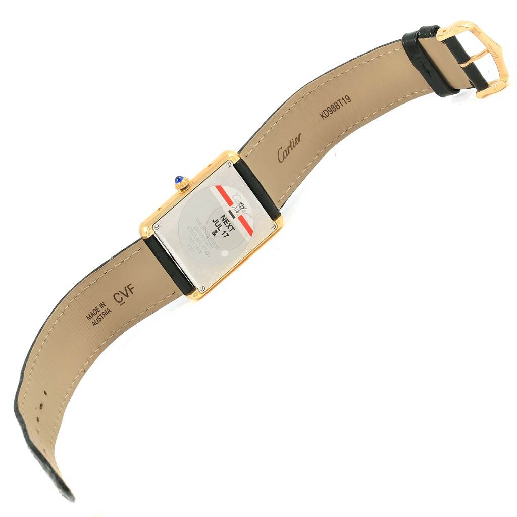 The image shows the back view of a Cartier Tank Solo W1018855 Steel and Gold (two tone) Silver Dial W1018855 Steel and Gold (two tone) Silver Dial watch, including the straps and the case back with brand markings.