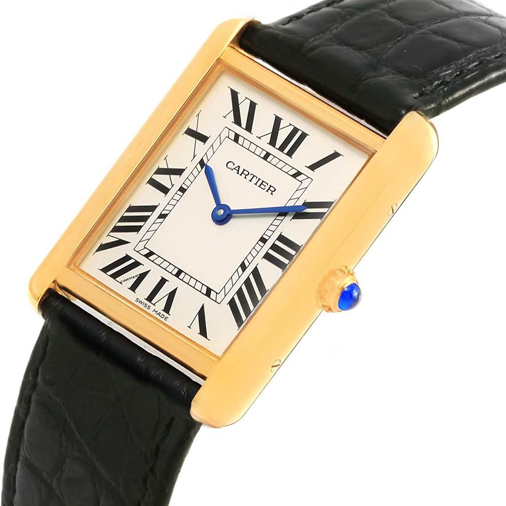 The Cartier Tank Solo W1018855 Steel and Gold (two tone) Silver Dial W1018855 Steel and Gold (two tone) Silver Dial watch is shown at a slight angle, highlighting its Roman numeral face, blue hands, crown, and black strap.