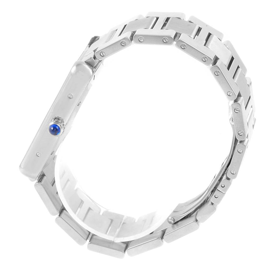 The image shows a side view of the Cartier Tank Solo W5200028 Men
s Stainless Steel Silver Dial W5200028 Men
s Stainless Steel Silver Dial watch, highlighting its bracelet and crown with a blue cabochon.
