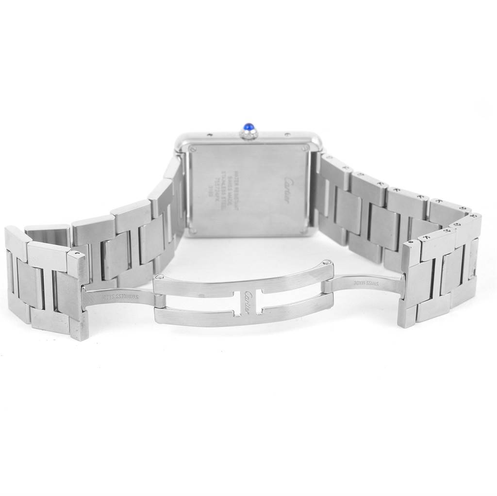 The image shows the back view and open clasp of a Cartier Tank Solo W5200014 Men
s Stainless Steel Silver Dial W5200014 Men
s Stainless Steel Silver Dial watch, highlighting the stainless steel bracelet and deployment buckle.