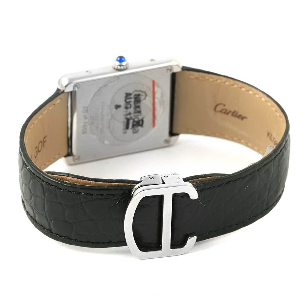 This image shows the back view of a Cartier Tank Solo W1018355 Stainless Steel Silver Dial W1018355 Stainless Steel Silver Dial watch, highlighting the case back, black leather strap, and the buckle.