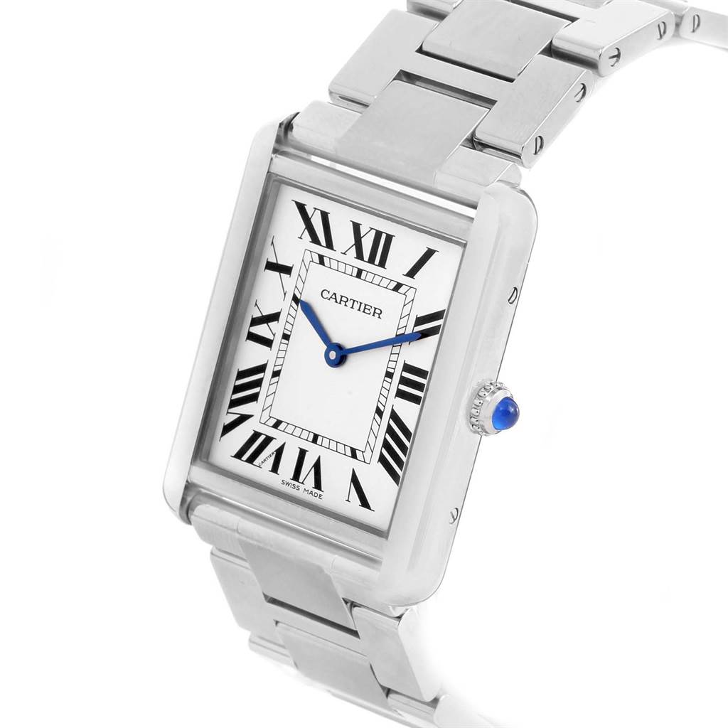 The Cartier Tank Solo W5200014 Stainless Steel Silver Dial W5200014 Stainless Steel Silver Dial watch is shown at a slight angle, displaying its face, bracelet, and the crown with a blue gem.