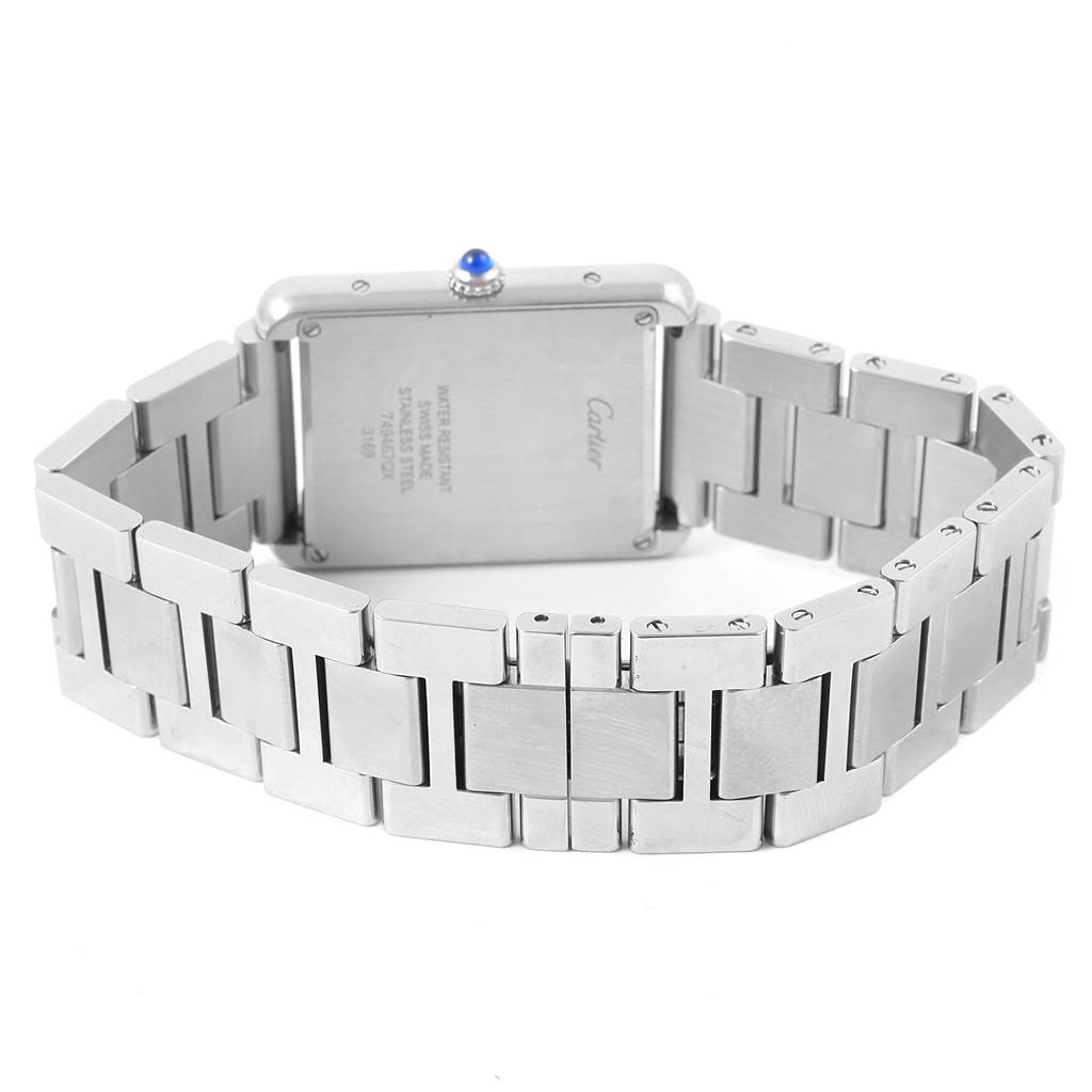 The image shows the back view of a Cartier Tank Solo W5200014 Stainless Steel Silver Dial W5200014 Stainless Steel Silver Dial watch, highlighting the stainless steel case and bracelet.