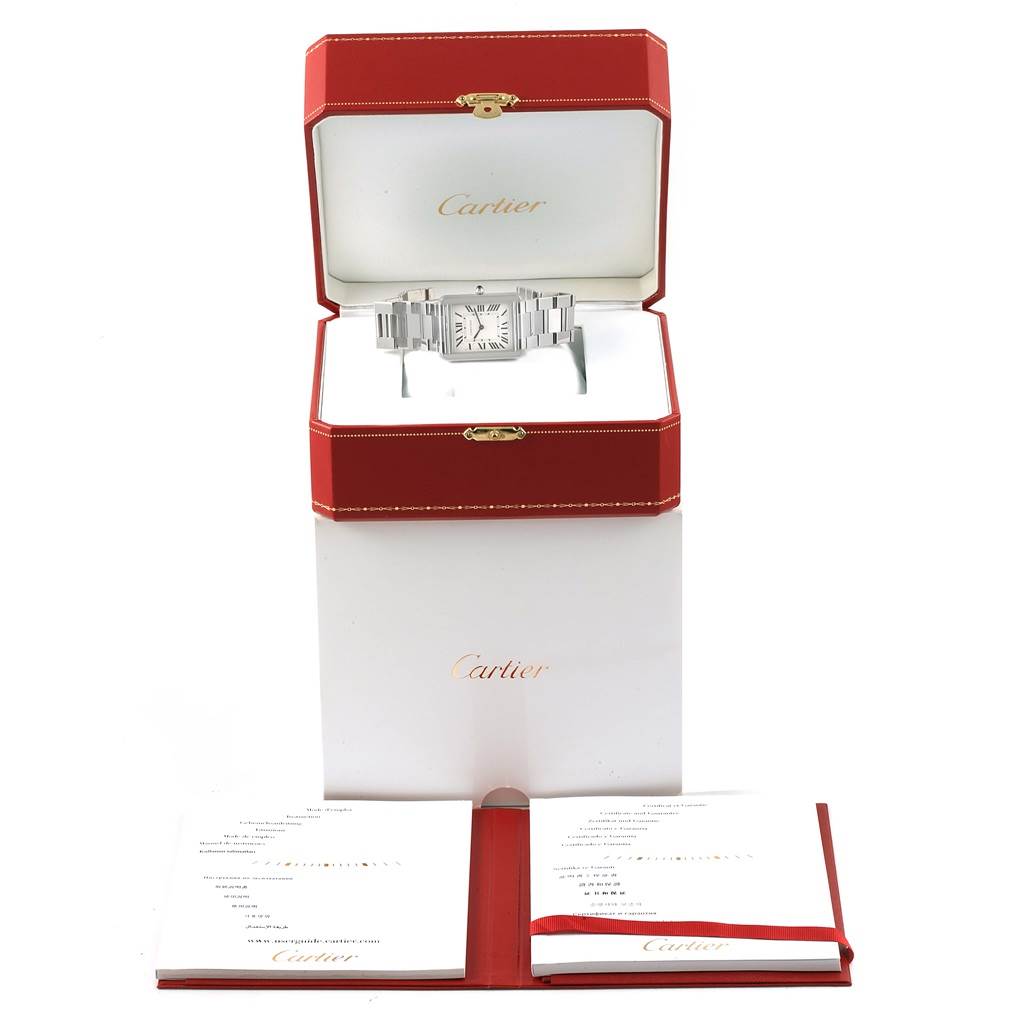 The Cartier Tank Solo W5200014 Stainless Steel Silver Dial W5200014 Stainless Steel Silver Dial watch is shown inside its red and white box, with accompanying booklets in front.