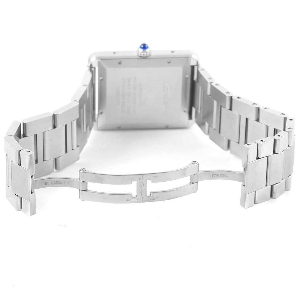 The image shows the back view of a Cartier Tank Solo W5200028 Men
s Stainless Steel Silver Dial W5200028 Men
s Stainless Steel Silver Dial watch, including its clasp and metal bracelet.