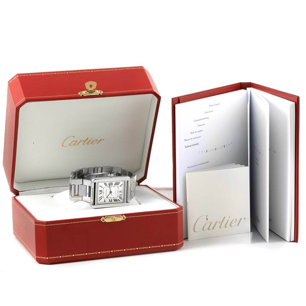 The image shows a Cartier Tank Solo W5200028 Men
s Stainless Steel Silver Dial W5200028 Men
s Stainless Steel Silver Dial watch, displayed in an open red box, accompanied by documentation.