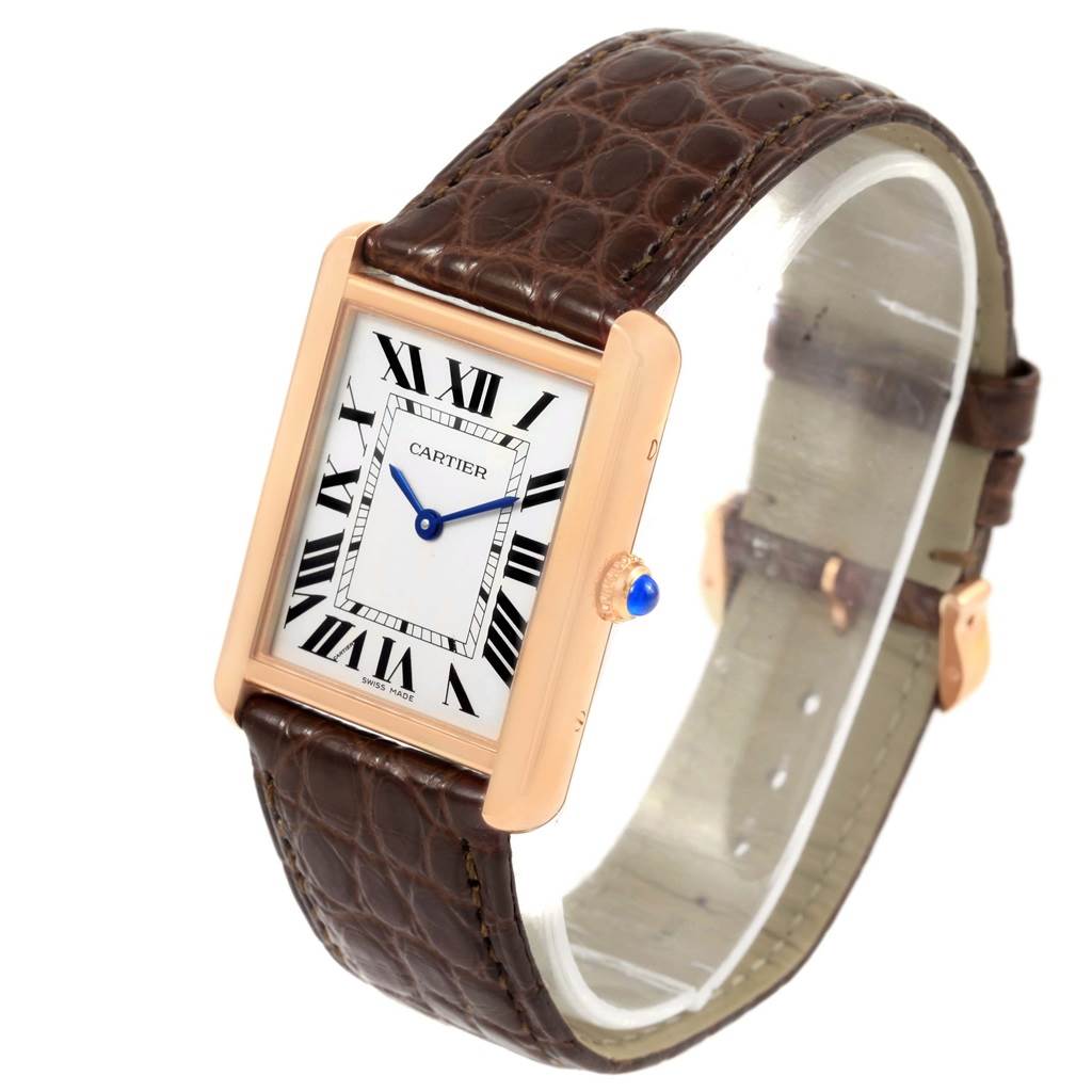 The image shows a Cartier Tank Solo W5200025 Steel and Gold (two tone) Silver Dial W5200025 Steel and Gold (two tone) Silver Dial watch at a three-quarter front angle, highlighting its face, case, crown, and leather strap.