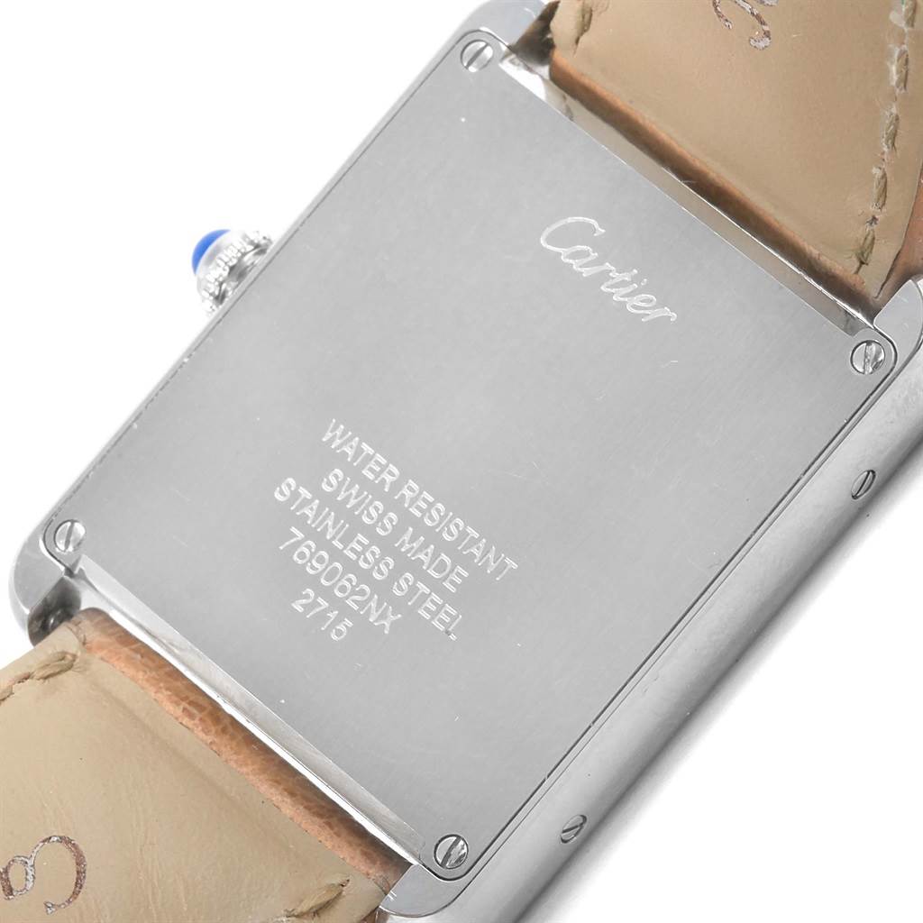 The image shows the back case of a Cartier Tank Solo W1018355 Stainless Steel Silver Dial W1018355 Stainless Steel Silver Dial watch, including the leather strap and stainless steel engraving.