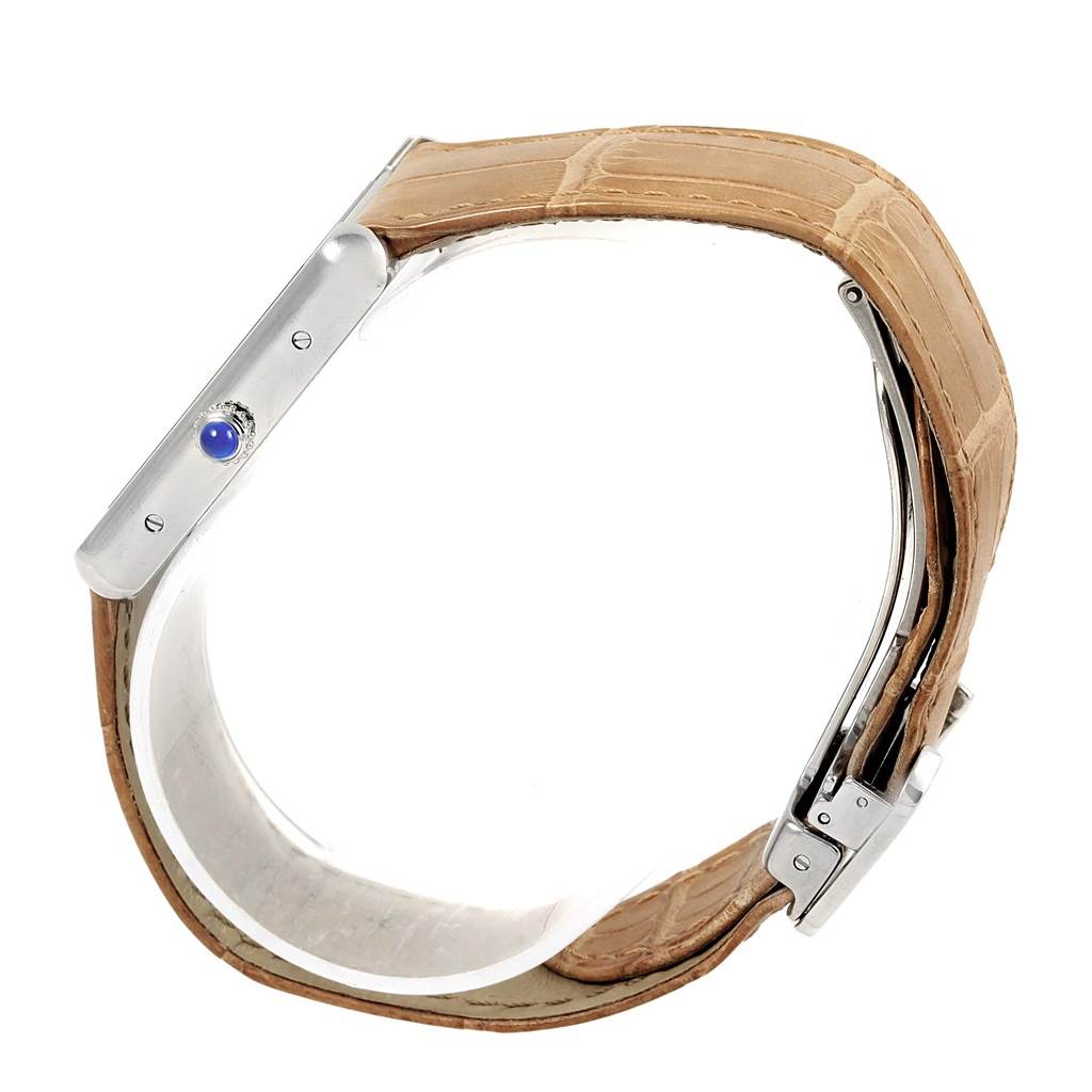 The image shows a side view of a Cartier Tank Solo W1018355 Stainless Steel Silver Dial W1018355 Stainless Steel Silver Dial watch, highlighting its crown, case, and beige leather strap.