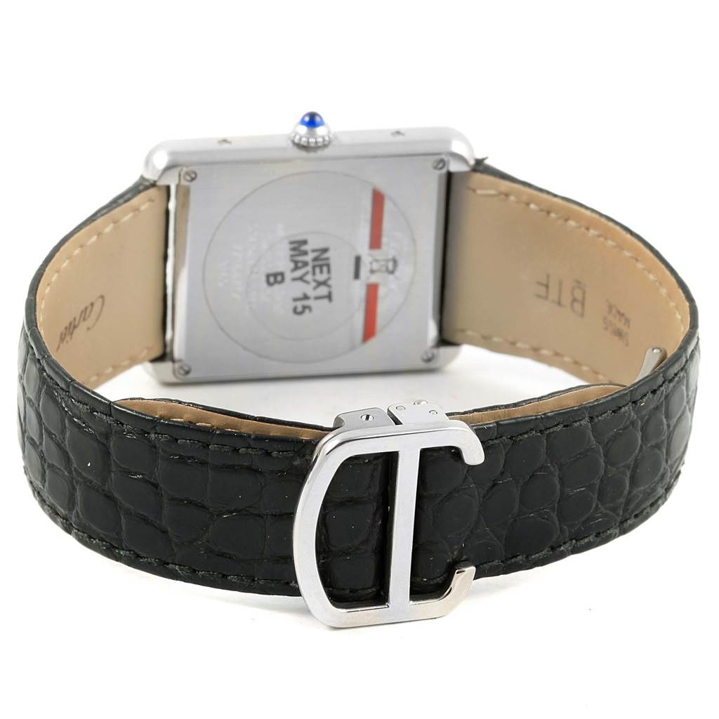The image shows the back view of a Cartier Tank Solo W1018355 Stainless Steel Silver Dial W1018355 Stainless Steel Silver Dial watch, displaying its strap, buckle, and back casing.