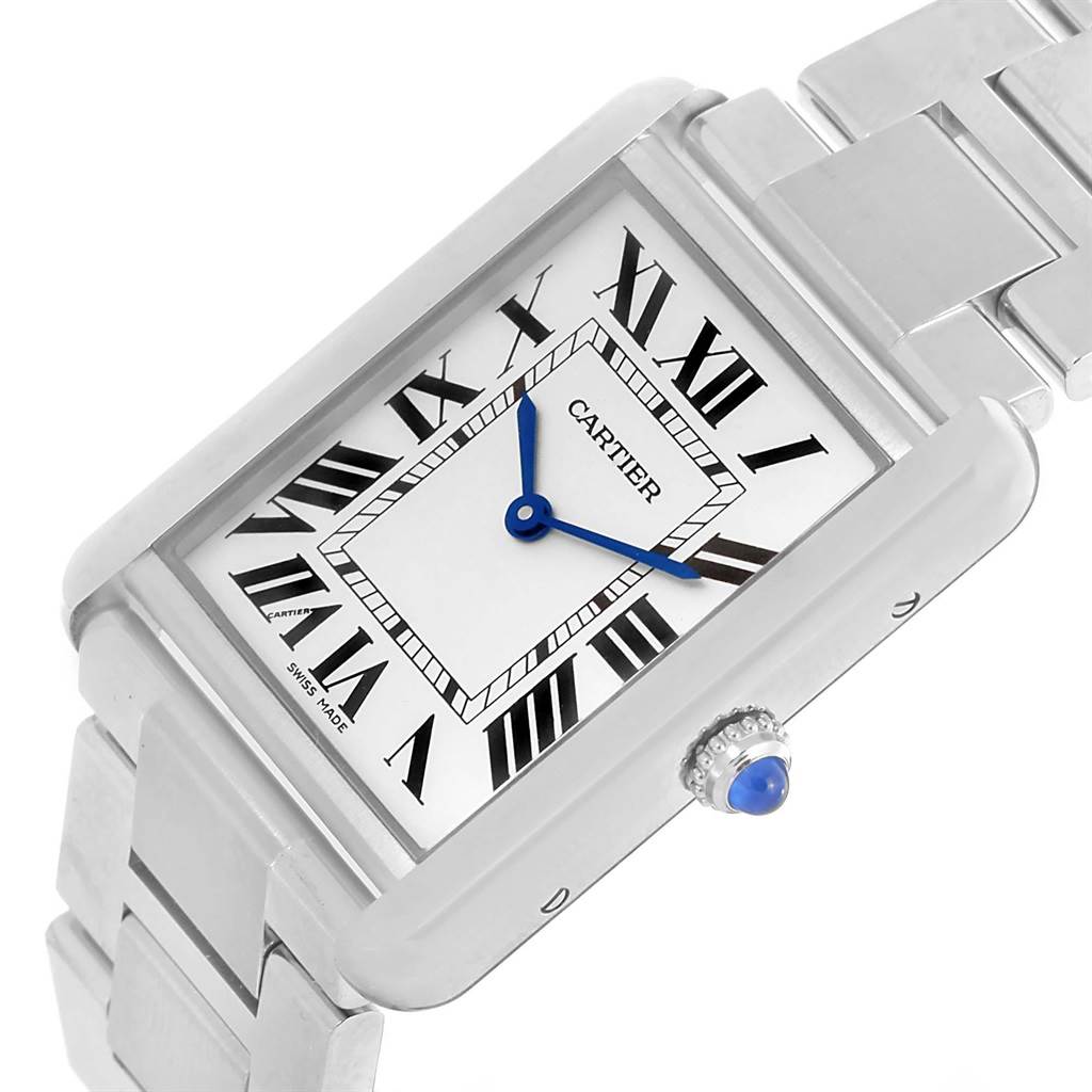 The image shows a close-up of the Cartier Tank Solo W5200014 Stainless Steel Silver Dial W5200014 Stainless Steel Silver Dial watch dial and part of its metal bracelet at an angled view.