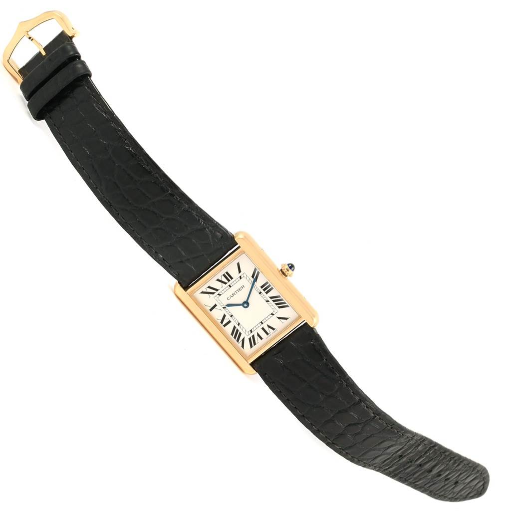 The image shows a Cartier Tank Solo W1018855 Steel and Gold (two tone) Silver Dial W1018855 Steel and Gold (two tone) Silver Dial watch with a gold case and black leather strap, viewed from above.