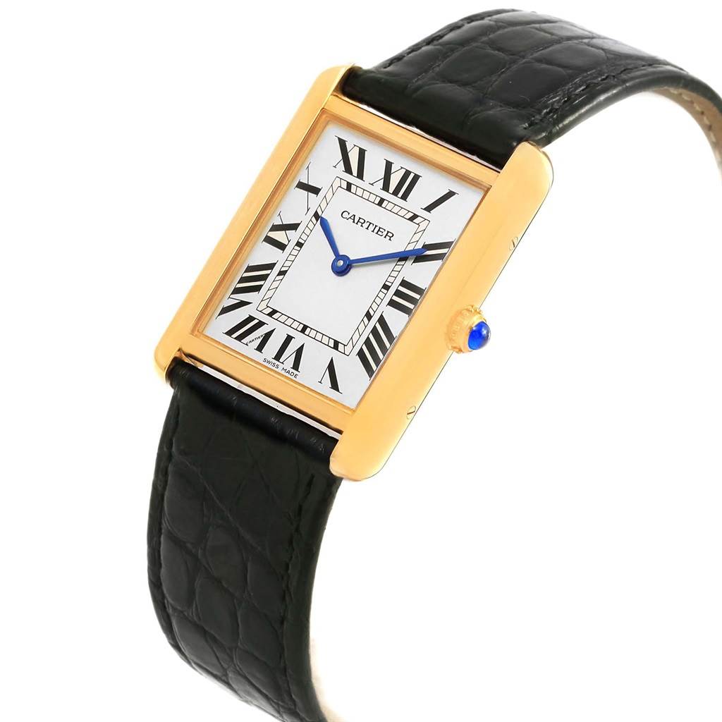 The image shows a Cartier Tank Solo W1018855 Steel and Gold (two tone) Silver Dial W1018855 Steel and Gold (two tone) Silver Dial watch from an angle highlighting the rectangular face, Roman numerals, and black leather strap.