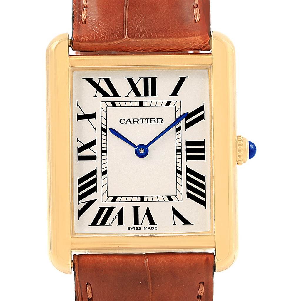 The image shows a frontal view of the Cartier Tank Solo W1018855 Steel and Gold (two tone) Silver Dial W1018855 Steel and Gold (two tone) Silver Dial watch, featuring its face, Roman numerals, hands, and part of the leather strap.