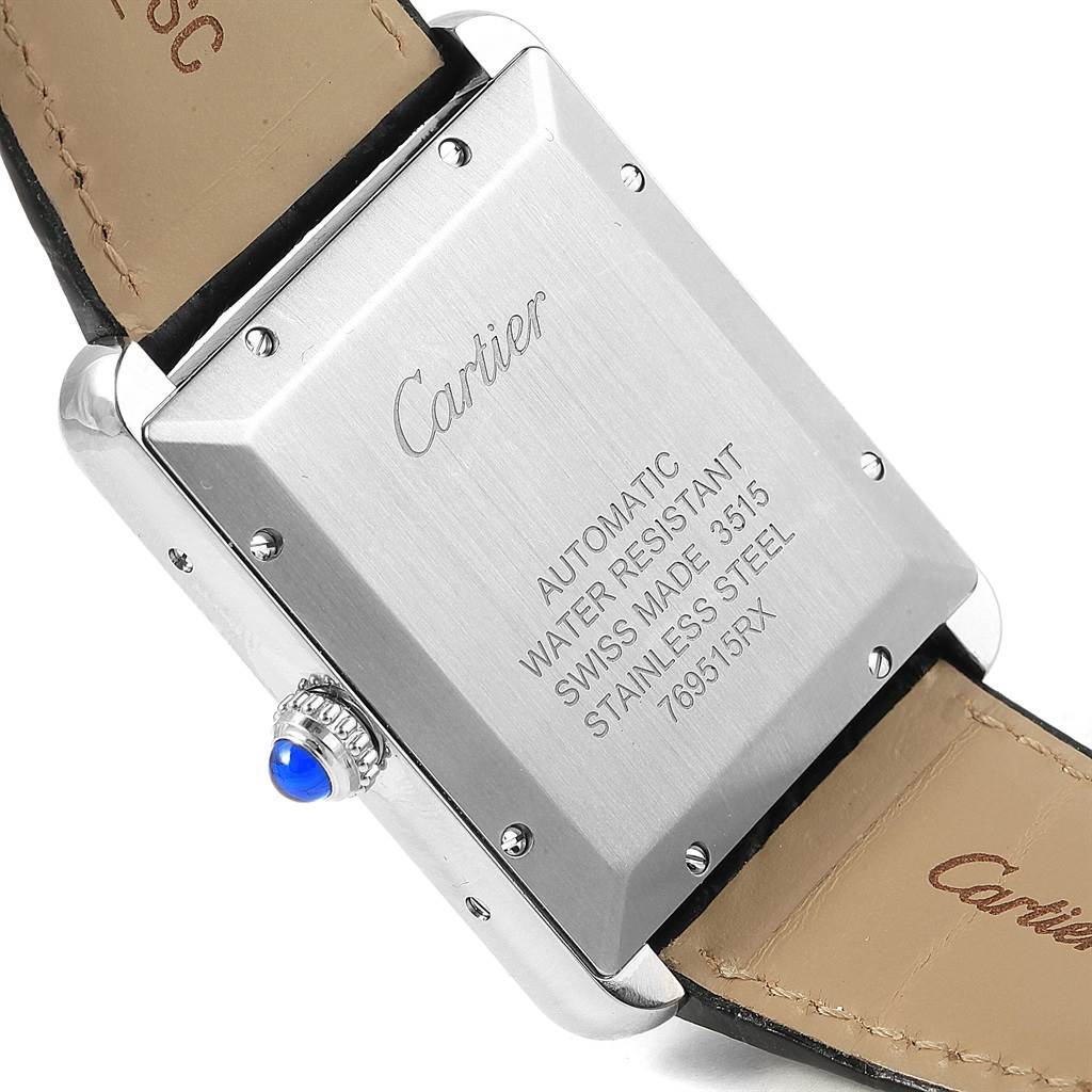The image shows the back case and part of the leather strap of a Cartier Tank Solo W5200027 Men
s Stainless Steel Silver Dial W5200027 Men
s Stainless Steel Silver Dial watch.