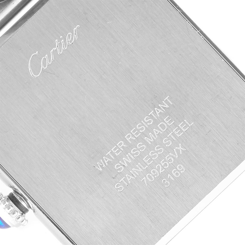 The image shows the back side of the Cartier Tank Solo W5200014 Men
s Stainless Steel Silver Dial W5200014 Men
s Stainless Steel Silver Dial watch, displaying brand markings and specifications.