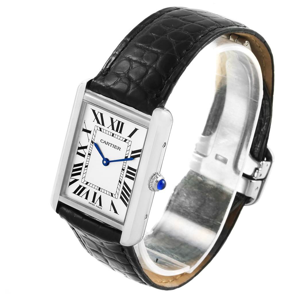 The image shows a Cartier Tank Solo W1018355 Men
s Stainless Steel Silver Dial W1018355 Men
s Stainless Steel Silver Dial watch at an angled view, displaying the dial, leather strap, crown, and clasp.