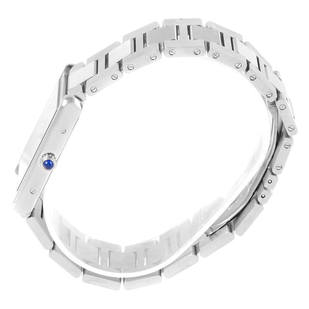 This is a side view of the Cartier Tank Solo W5200014 Men
s Stainless Steel Silver Dial W5200014 Men
s Stainless Steel Silver Dial watch showing its metal bracelet and the blue cabochon crown.