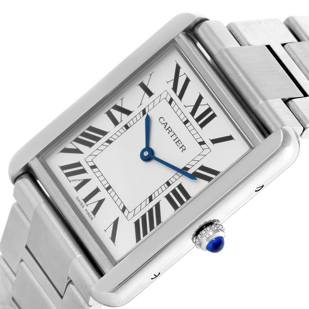 The image shows a close-up of the Cartier Tank Solo W5200014 Men
s Stainless Steel Silver Dial W5200014 Men
s Stainless Steel Silver Dial watch tilted at an angle, focusing on its face, bezel, and part of the bracelet.