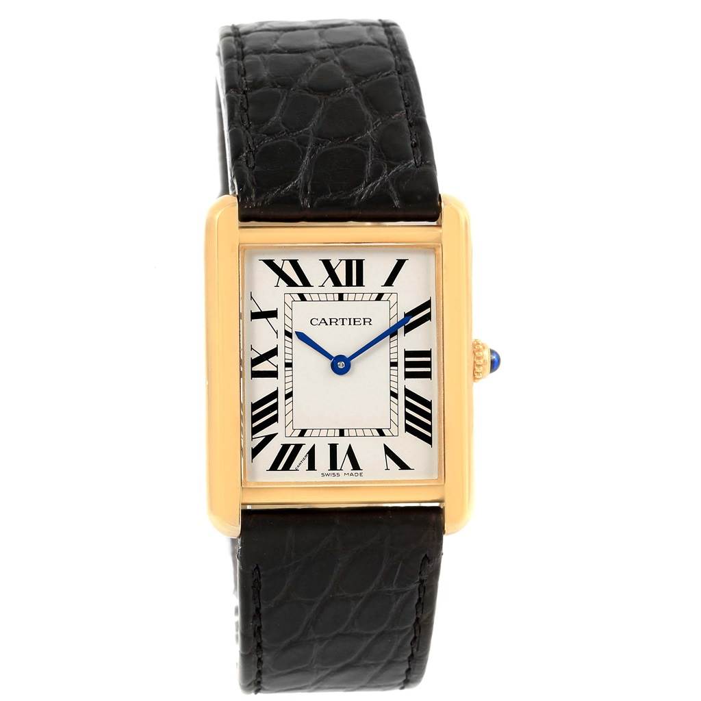 This front-facing image of the Cartier Tank Solo W1018855 Steel and Gold (two tone) Silver Dial W1018855 Steel and Gold (two tone) Silver Dial watch shows its rectangular dial, Roman numerals, blue hands, and black leather strap.