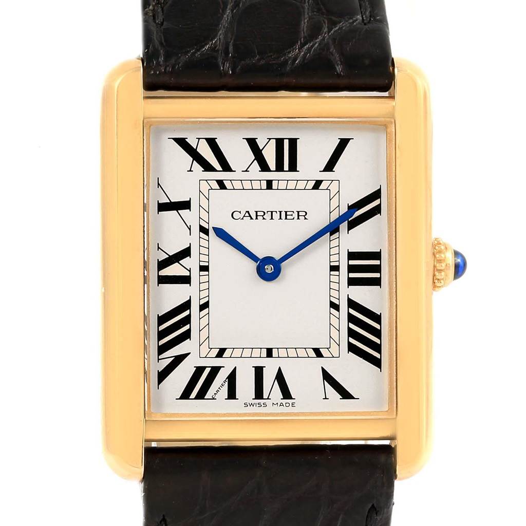 This image shows a front view of the Cartier Tank Solo W1018855 Steel and Gold (two tone) Silver Dial W1018855 Steel and Gold (two tone) Silver Dial watch face and part of its black leather strap.