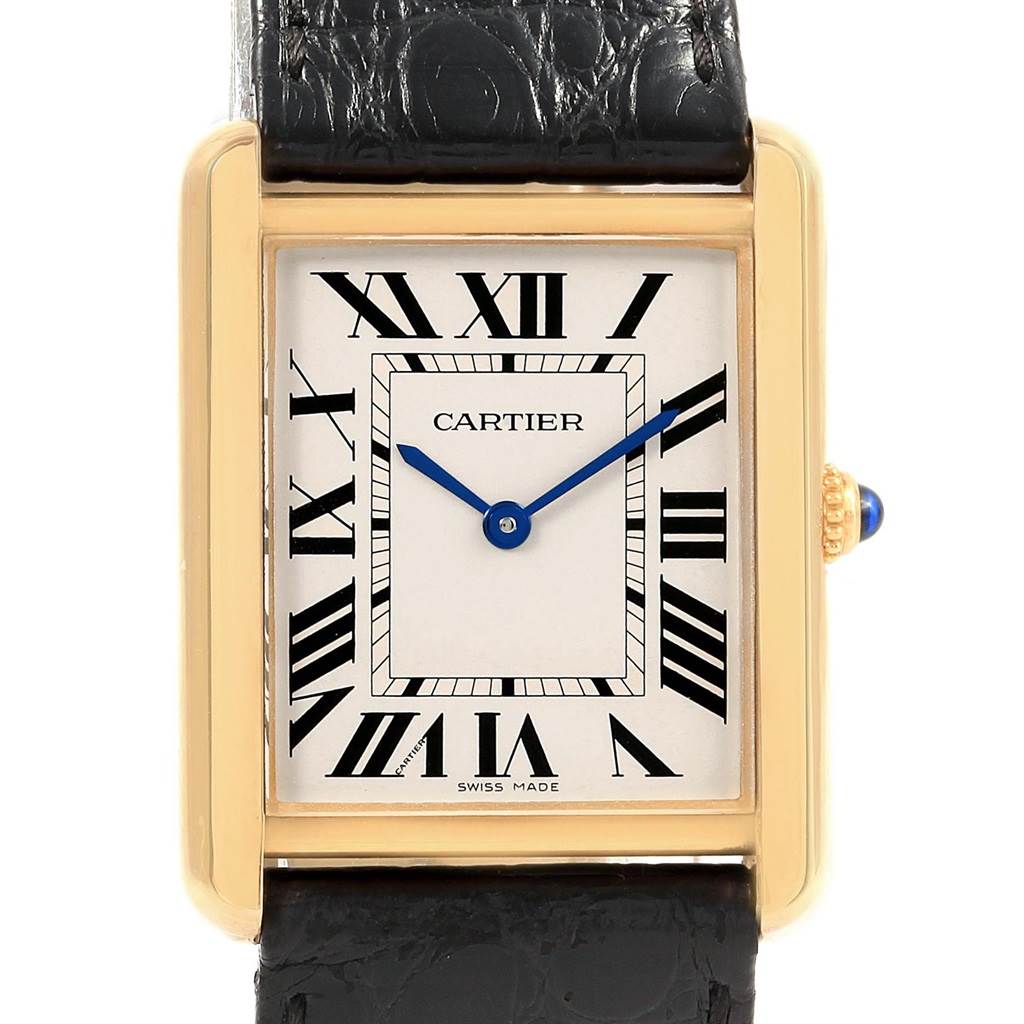 This image shows a front view of a Cartier Tank Solo W1018855 Men
s Steel and Gold (two tone) Silver Dial W1018855 Men
s Steel and Gold (two tone) Silver Dial watch, highlighting its rectangular face, Roman numerals, gold case, and black leather strap.