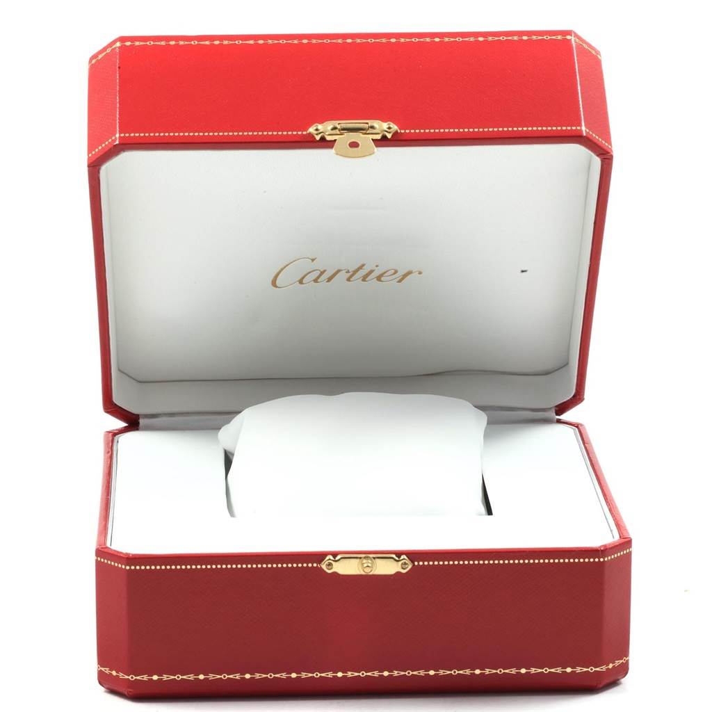 The image shows the open red box of a Cartier Tank Solo W1018855 Men
s Steel and Gold (two tone) Silver Dial W1018855 Men
s Steel and Gold (two tone) Silver Dial watch but does not reveal the watch itself.