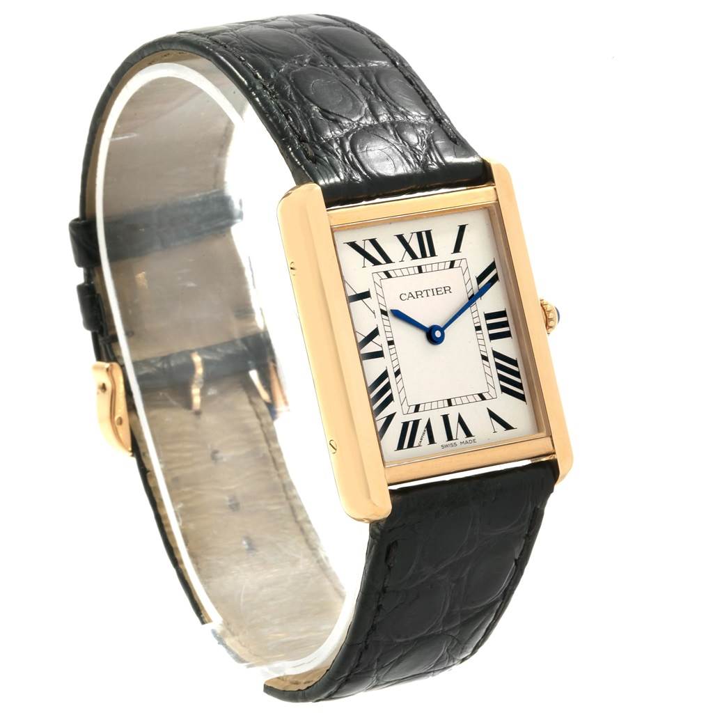 The image shows a Cartier Tank Solo W1018855 Men
s Steel and Gold (two tone) Silver Dial W1018855 Men
s Steel and Gold (two tone) Silver Dial watch from a front angle, featuring its rectangular face, Roman numerals, and black leather strap.