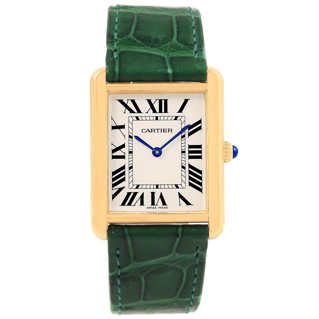 The Cartier Tank Solo W1018855 Steel and Gold (two tone) Silver Dial W1018855 Steel and Gold (two tone) Silver Dial watch is shown from a straight-on angle, showcasing the face, Roman numeral dial, and green leather strap.