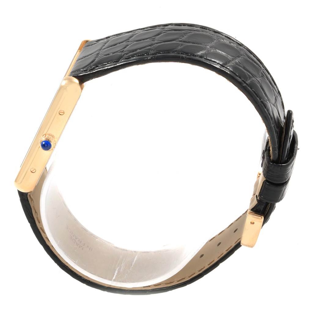 The image shows a side view of a Cartier Tank Solo W1018855 Men's Steel and Gold (two tone) Silver Dial W1018855 Men's Steel and Gold (two tone) Silver Dial watch with a black leather strap and visible crown.