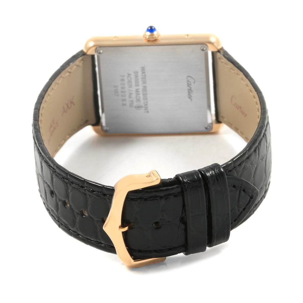 This image shows the back view of a Cartier Tank Solo W1018855 Men's Steel and Gold (two tone) Silver Dial W1018855 Men's Steel and Gold (two tone) Silver Dial watch, highlighting the strap and the case back.