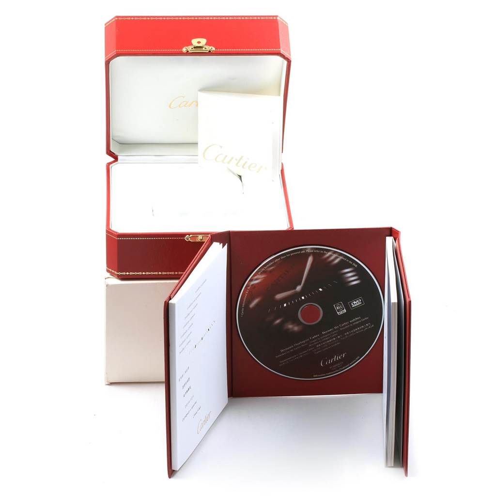 The image shows the packaging and accessories (box, booklet, CD) for a Cartier Tank Solo W1018855 Men's Steel and Gold (two tone) Silver Dial W1018855 Men's Steel and Gold (two tone) Silver Dial watch.