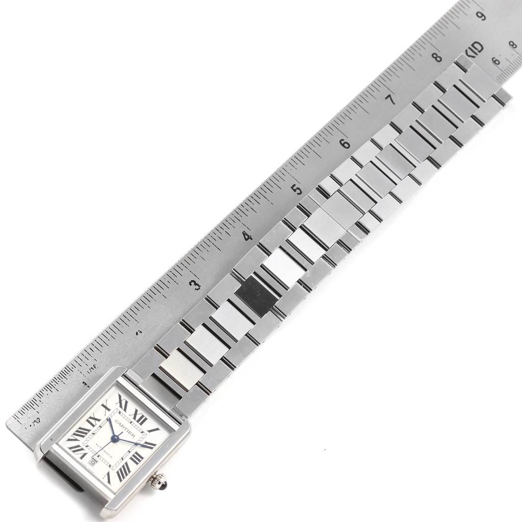 The image shows the face and metal bracelet of a Cartier Tank Solo W5200028 Men
s Stainless Steel Silver Dial W5200028 Men
s Stainless Steel Silver Dial watch, aligned next to a ruler for measurement.