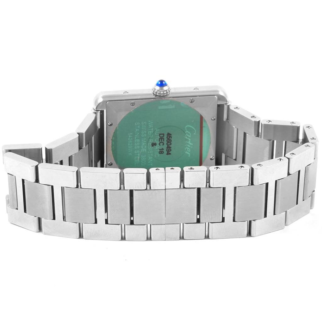 The image shows the back view of a Cartier Tank Solo W5200028 Men
s Stainless Steel Silver Dial W5200028 Men
s Stainless Steel Silver Dial watch, highlighting its stainless steel case, bracelet, and sapphire cabochon crown.