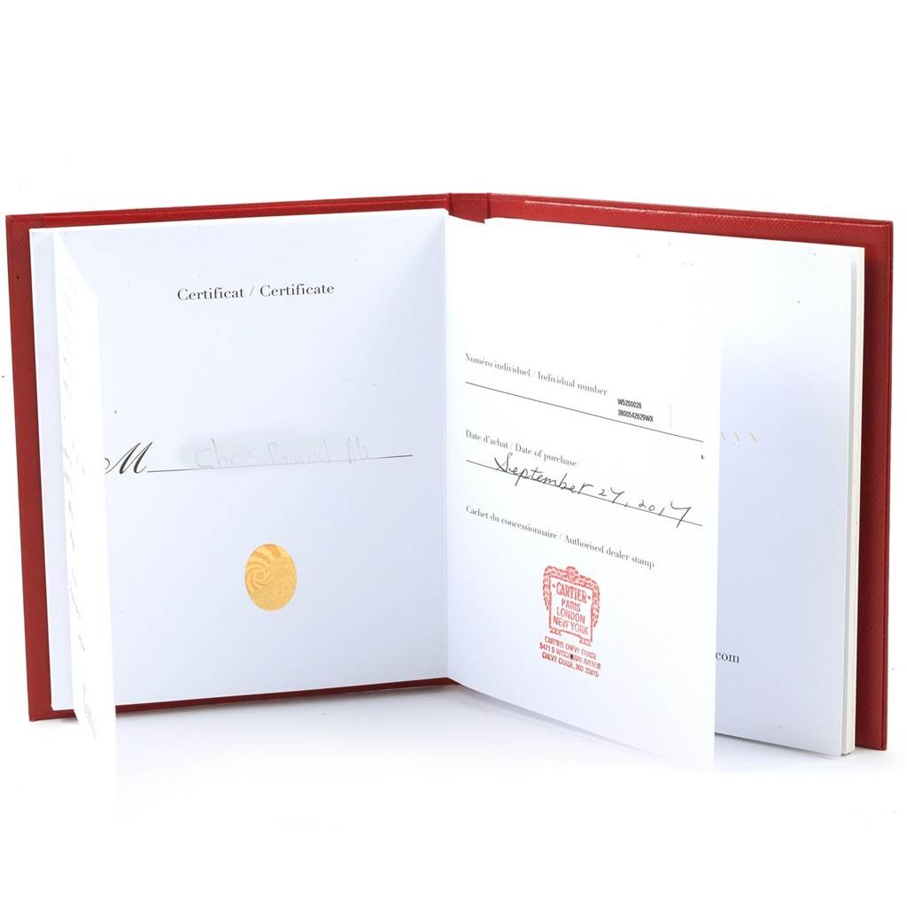 The image shows an open warranty certificate booklet for a Cartier Tank Solo W5200028 Men
s Stainless Steel Silver Dial W5200028 Men
s Stainless Steel Silver Dial watch.