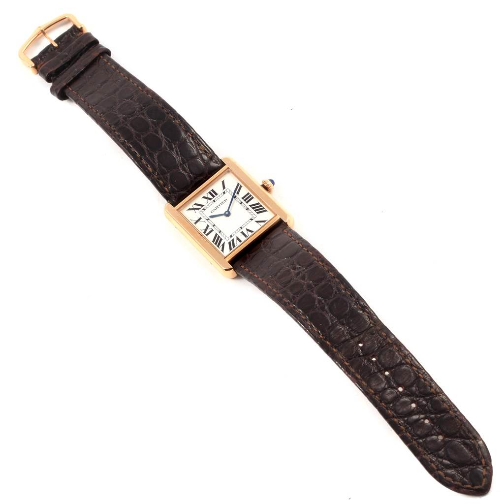 This image shows a top view of the Cartier Tank Solo W5200025 Women's Steel and Gold (two tone) Silver Dial W5200025 Women's Steel and Gold (two tone) Silver Dial watch with its entire face and leather strap visible.