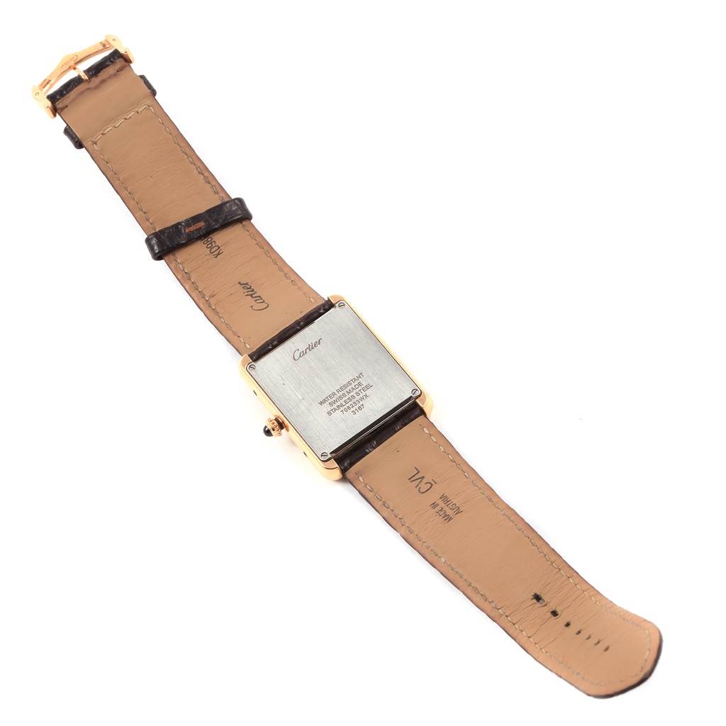 The image shows the back view of a Cartier Tank Solo W5200025 Women's Steel and Gold (two tone) Silver Dial W5200025 Women's Steel and Gold (two tone) Silver Dial watch, displaying its case back and leather strap.