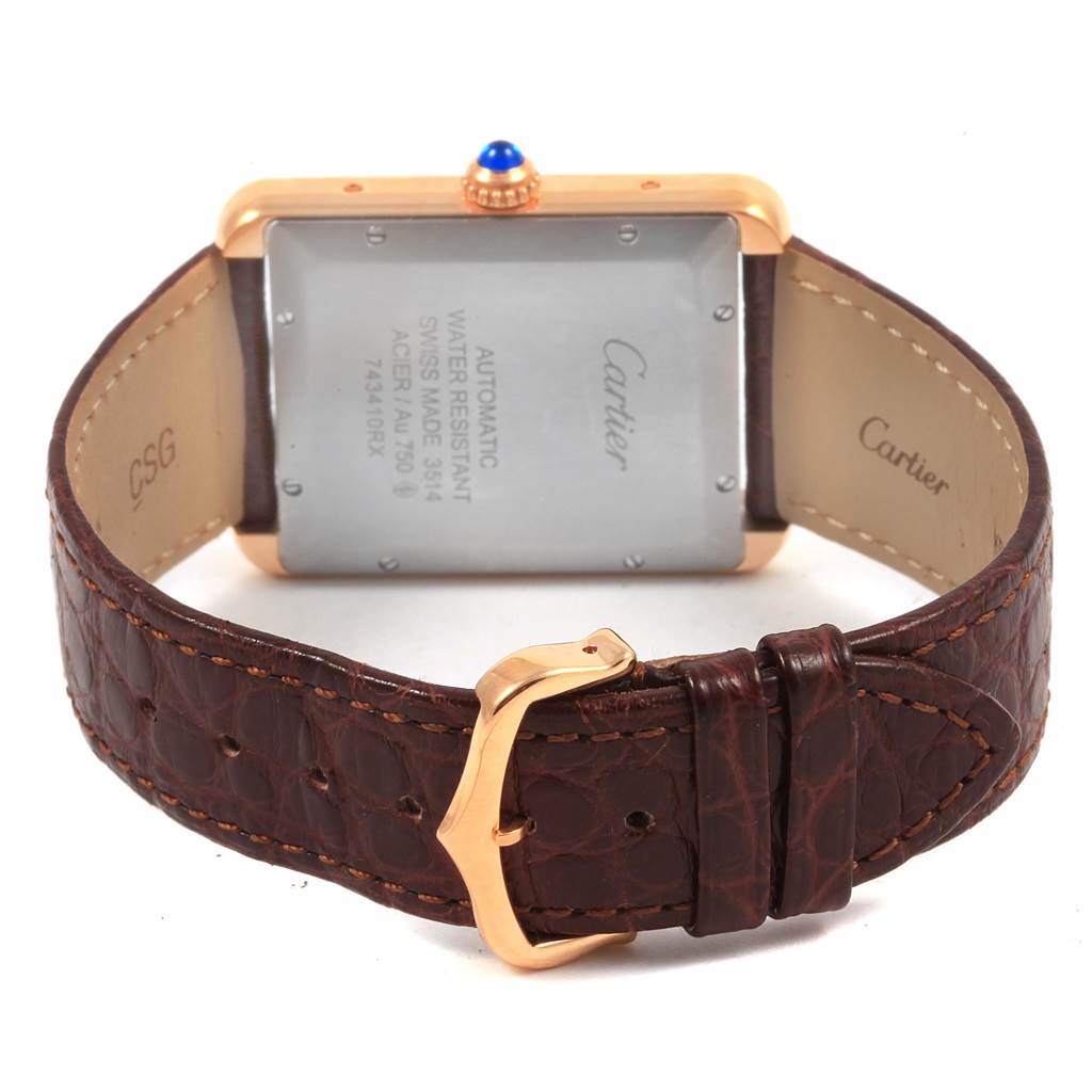 The image shows the back and strap of a Cartier Tank Solo W5200026 Men
s Steel and Gold (two tone) Silver Dial W5200026 Men
s Steel and Gold (two tone) Silver Dial watch, highlighting the buckle and leather band.